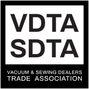 The logo of the Vacuum & Sewing Dealers Trade Association (VDTA SDTA) features bold black text on a green background, encased in a black border, representing its central vacuum systems focus in Long Island, NY.
