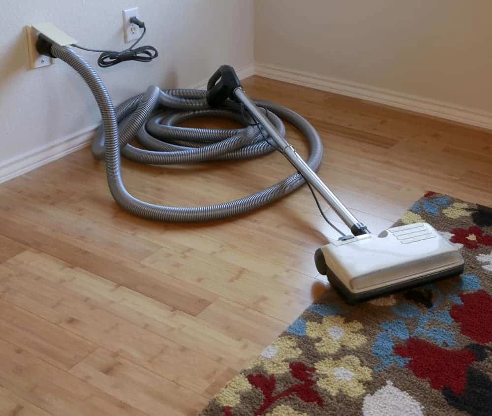 A vacuum cleaner on a hardwood floor